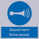 sound-horn-drive-slowly-warehousing-and-delivery-sign~